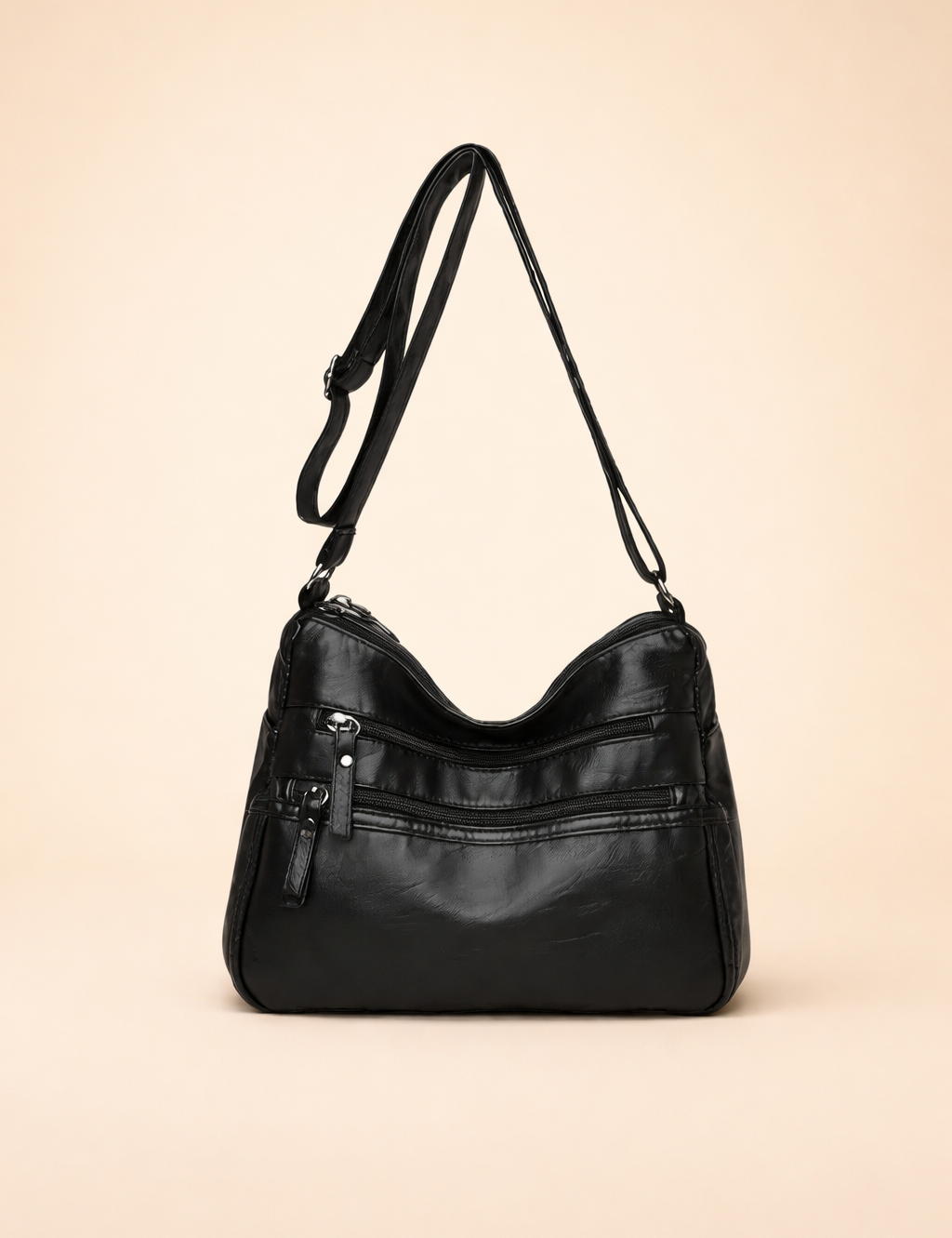 black-leather-shoulder-bag-elegant-studio-pose-front-vie.png