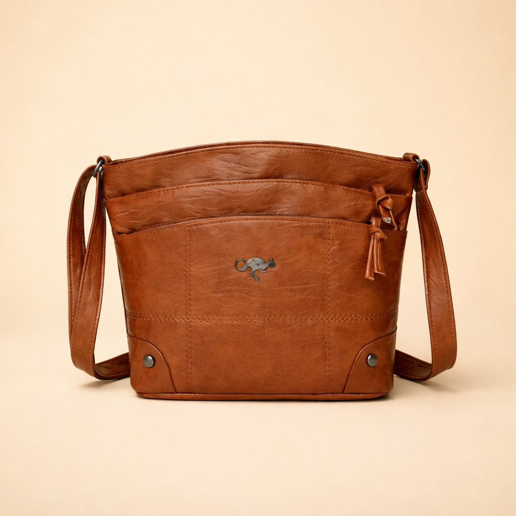 brown-leather-crossbody-bag-model-style-front-view-european-fashion-studio.png