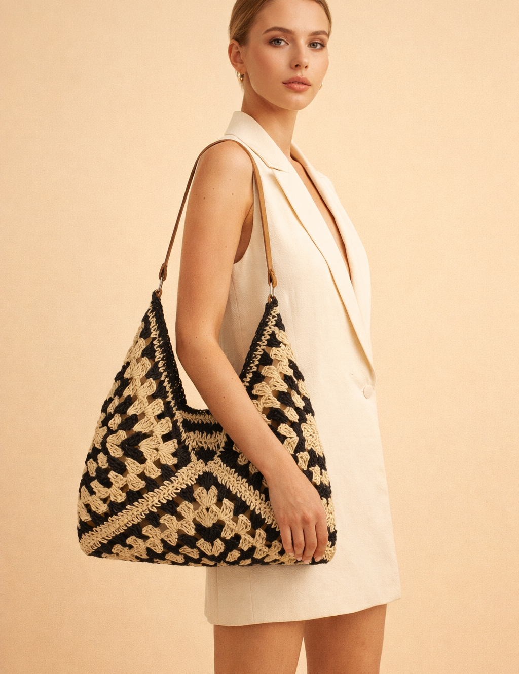 polish-female-model-wearing-black-beige-crochet-shoulder-bag-studio-fashion-pose.png