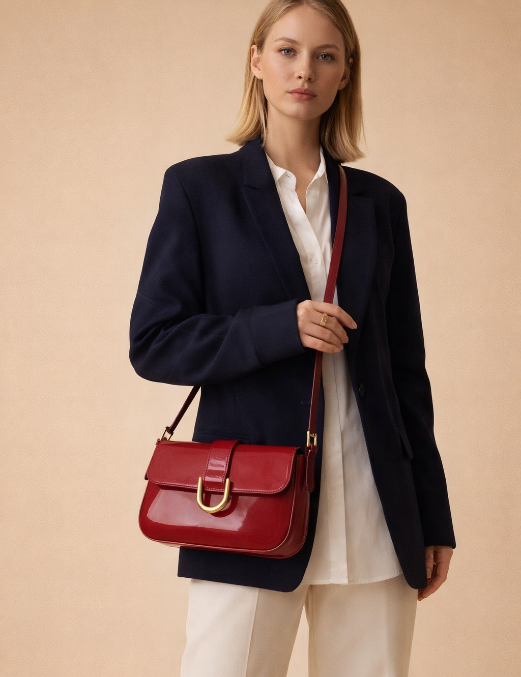 polish-female-model-wearing-red-leather-shoulder-bag-european-studio-fashion-pose.png