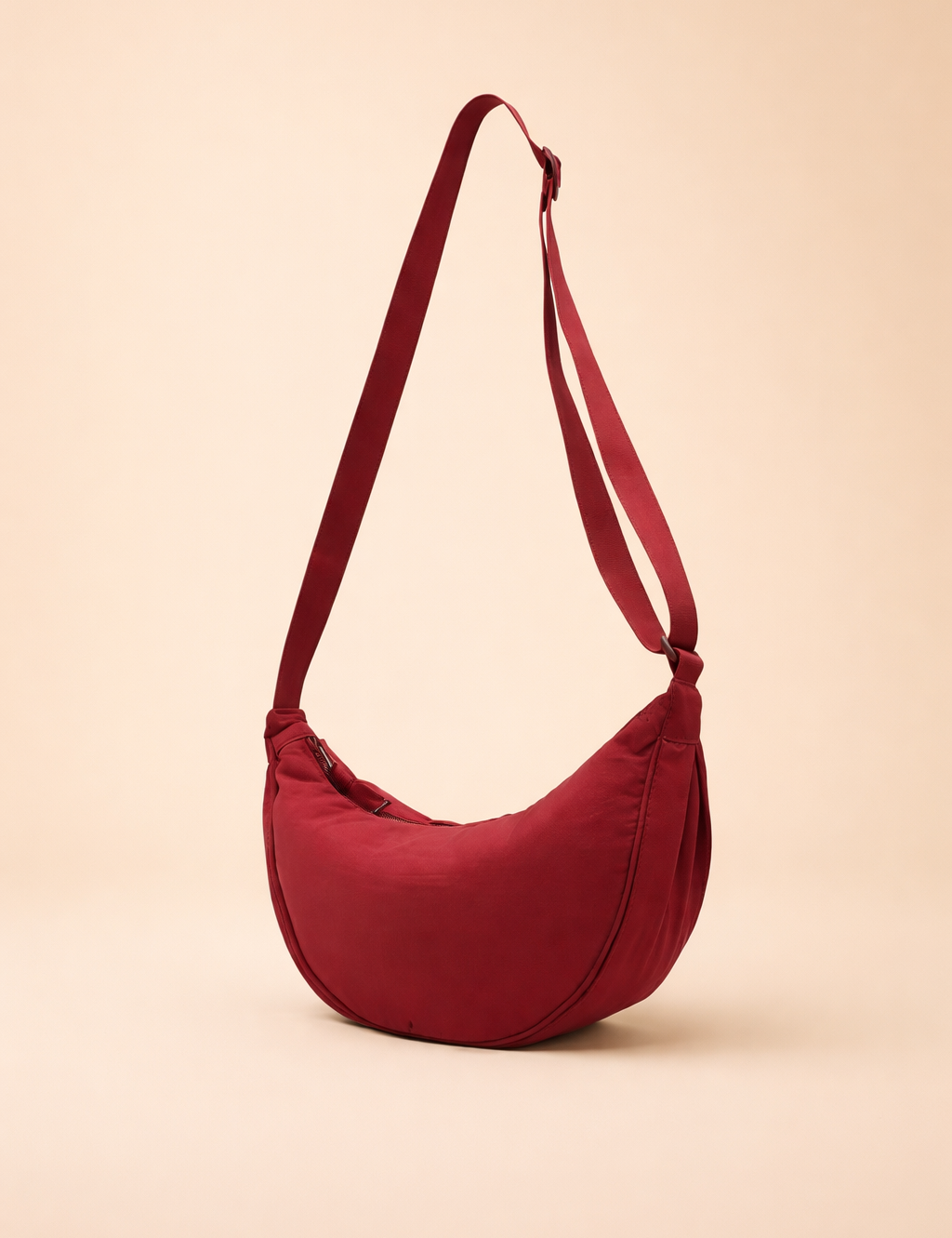 red-crescent-crossbody-bag-shoulder-wear-studio-fashion-look.png